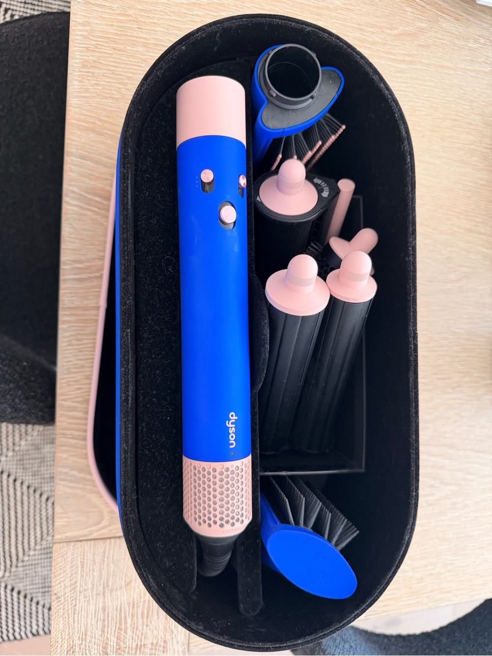 Dyson styling set in vivid blue with soft pink accents
